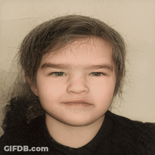 A Young Girl With A Serious Look On Her Face Is Wearing A Black Sweater GIF
