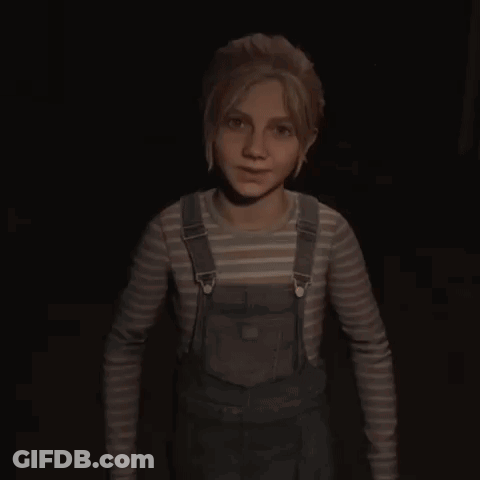 A Young Girl With Blonde Hair And Freckles Is Looking At The Camera In A Dark Room . GIF