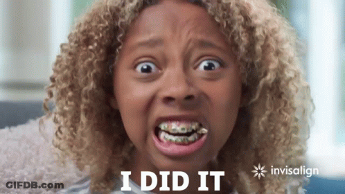 A Young Girl With Braces On Her Teeth Is Making A Funny Face With The Words I Did It In The Background GIF