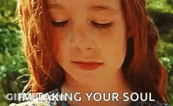 A Young Girl With Red Hair Is Taking Your Soul GIF