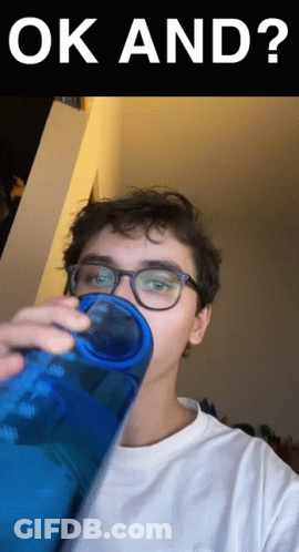 A Young Man Drinking From A Blue Bottle With The Words Ok And Written Above Him GIF