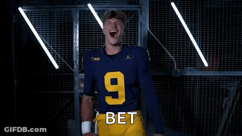 A Young Man In A Blue Jersey Is Smiling And Holding His Hands To His Chest . GIF