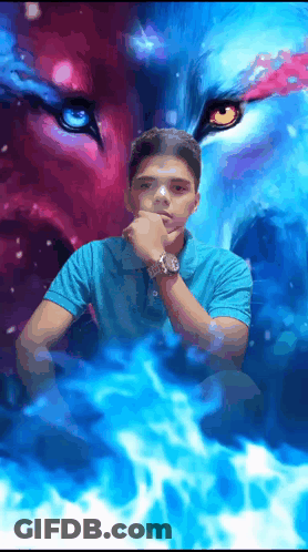A Young Man In A Blue Shirt Stands In Front Of A Painting Of A Wolf 'S Face GIF