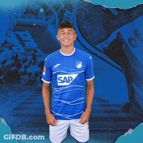 A Young Man In A Blue Shirt With The Word Sap On It GIF