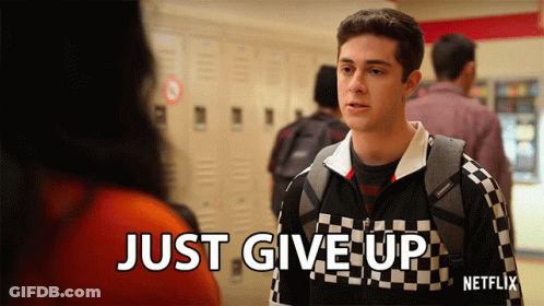 A Young Man In A Checkered Jacket Says " Just Give Up " GIF
