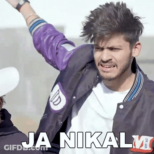 A Young Man In A Purple Jacket Says Ja Nikal GIF