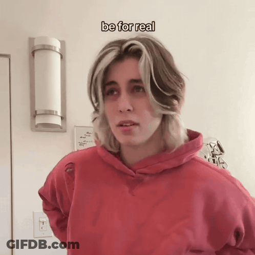 Young Man In Red Hoodie Standing Under Be For Real Text GIF