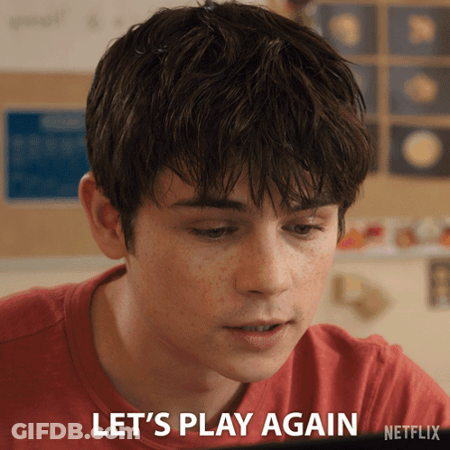 A Young Man In A Red Shirt Is Saying Let 'S Play Again GIF