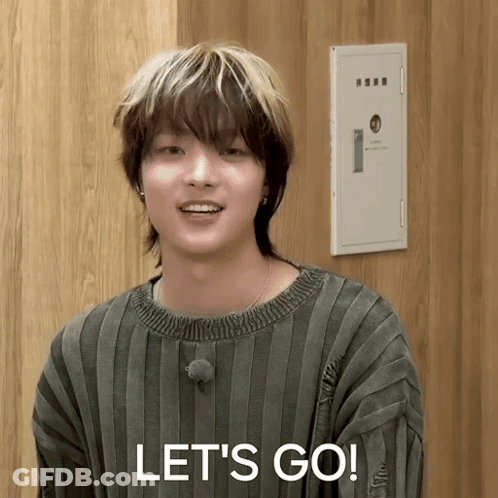 A Young Man In A Striped Sweater Says " Let 'S Go " GIF
