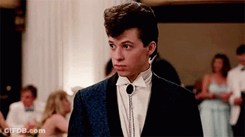 Young Man In Tuxedo At Party GIF