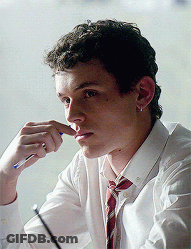 A Young Man In A White Shirt And Red Tie Is Holding A Pen To His Nose GIF