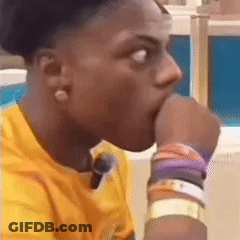 A Young Man In A Yellow Shirt Is Biting His Thumb . GIF
