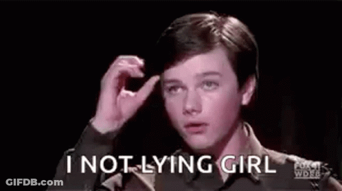A Young Man Is Holding His Hair In His Hand And Says `` I Not Lying Girl '' . GIF