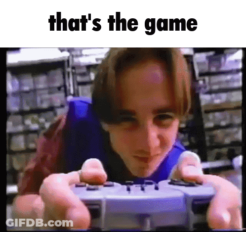 A Young Man Is Playing A Video Game With The Words That 'S The Game Below Him GIF