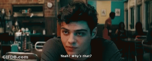 A Young Man Is Sitting At A Table In A Diner And Asking Why 'S That ? GIF