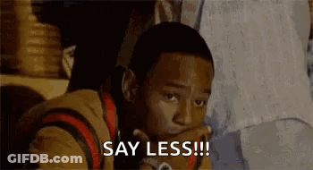 A Young Man Is Sitting Down With His Hand On His Chin And Saying `` Say Less !! '' . GIF