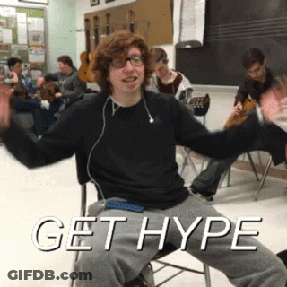 A Young Man Is Sitting In A Chair With The Words Get Hype Written Above Him GIF