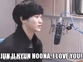 A Young Man Is Sitting In Front Of A Microphone And Saying `` Jun Ji Hyun Noona , I Love You '' . GIF