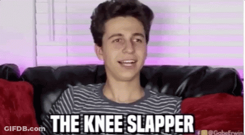 A Young Man Is Sitting On A Couch With The Words " The Knee Slapper " Above Him GIF
