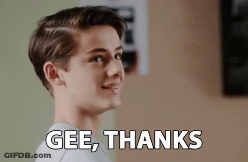 A Young Man Is Smiling With The Words Gee Thanks Above Him GIF