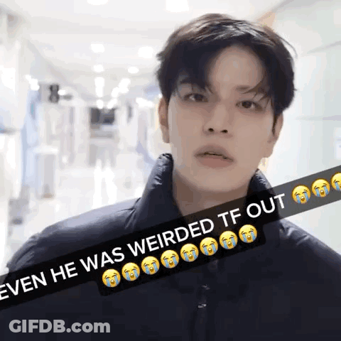 A Young Man Is Standing In A Hallway With A Caption That Says " Even He Was Weirded Tf Out " GIF