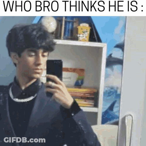 A Young Man Is Taking A Selfie In Front Of A Mirror With The Caption `` Who Bro Thinks He Is '' . GIF