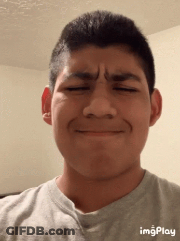 A Young Man Making A Funny Face With Imgplay Displayed On The Bottom Right GIF