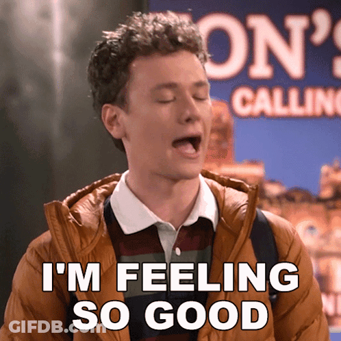 A Young Man Says I 'M Feeling So Good In Front Of A London Calling Sign GIF