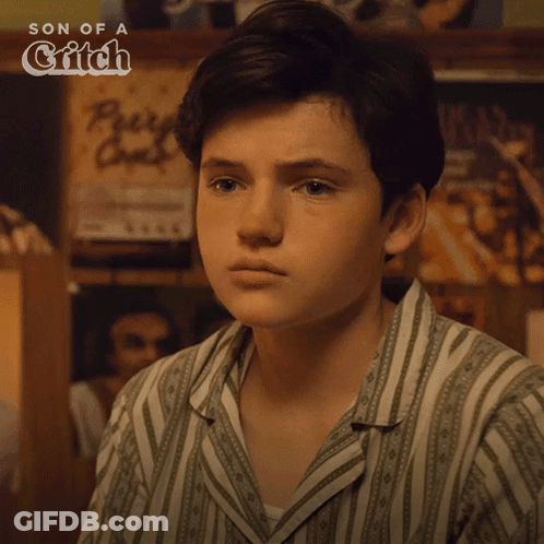 A Young Man Says " I 'M Not A Kid Anymore " In A Striped Shirt GIF