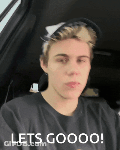 A Young Man Sitting In A Car With The Words Lets Goooo On The Bottom GIF