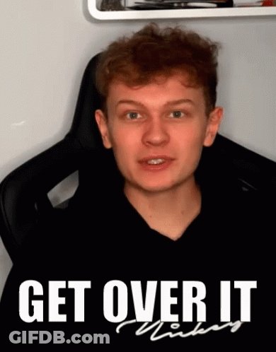 A Young Man Sitting In A Chair With The Words " Get Over It " Written On The Bottom GIF