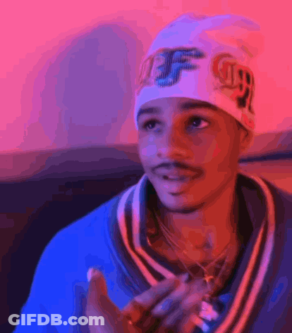 A Young Man Wearing A Beanie With The Letter Ff On It GIF