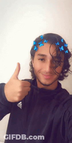 A Young Man Wearing A Black Adidas Jacket Giving A Thumbs Up GIF