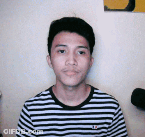 A Young Man Wearing A Black And White Striped Shirt With A French Flag On It GIF