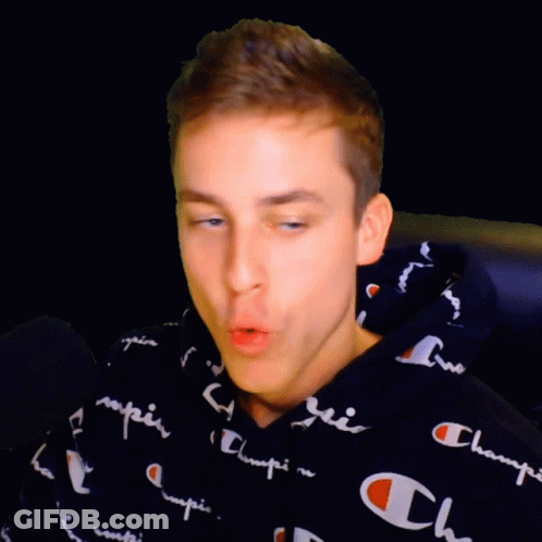 A Young Man Wearing A Black Champion Hoodie GIF