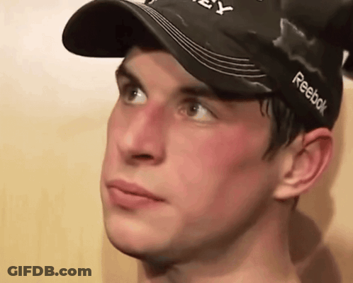 A Young Man Wearing A Black Reebok Hat GIF