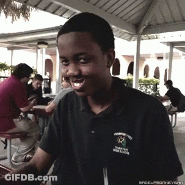 A Young Man Wearing A Black Shirt That Says Charter High School GIF
