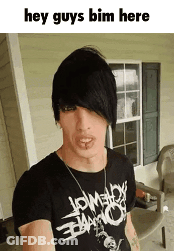 A Young Man Wearing A Black Shirt With The Words Hey Guys Bim Here On The Bottom GIF