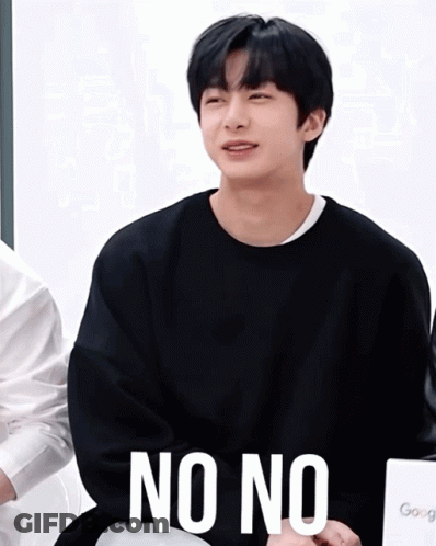 A Young Man Wearing A Black Sweater Says " No No " GIF
