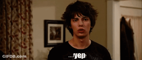A Young Man Wearing A Black T-Shirt That Says Vep GIF
