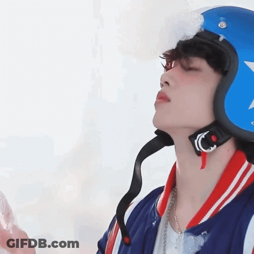 A Young Man Wearing A Blue Helmet With A Star On It GIF