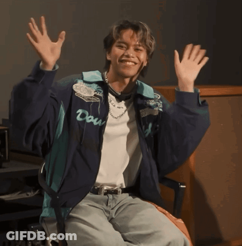A Young Man Wearing A Blue Jacket With The Word Dow On It GIF