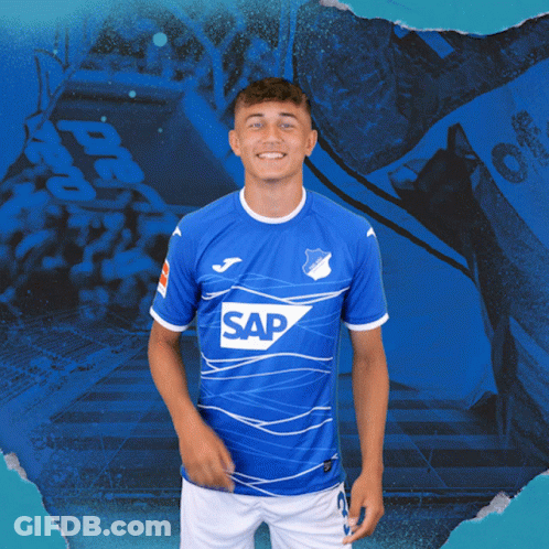 A Young Man Wearing A Blue Shirt With The Word Sap On It GIF