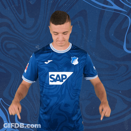 A Young Man Wearing A Blue Shirt With The Word Sap On It GIF