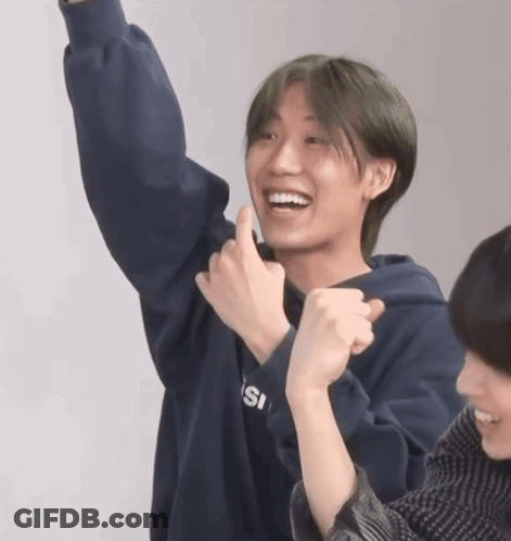 A Young Man Wearing A Blue Sweatshirt That Says Isi On It GIF