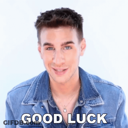 A Young Man Wearing A Denim Jacket Says Good Luck GIF