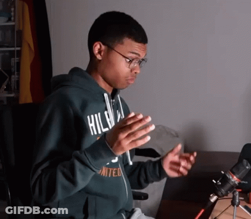 A Young Man Wearing A Green Hoodie That Says United On It GIF