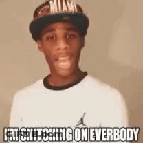A Young Man Wearing A Hat And A White Shirt Is Smiling And Saying `` I 'M Snitching On Everybody '' GIF