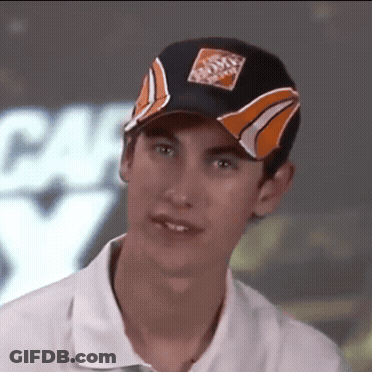A Young Man Wearing A Home Depot Hat Looks At The Camera GIF