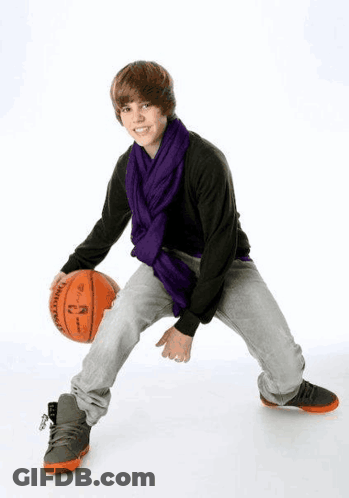 Young Man With Purple Scarf Holding Basketball GIF